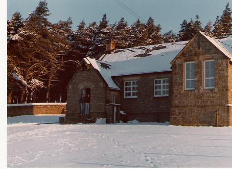 Snowy view of old school